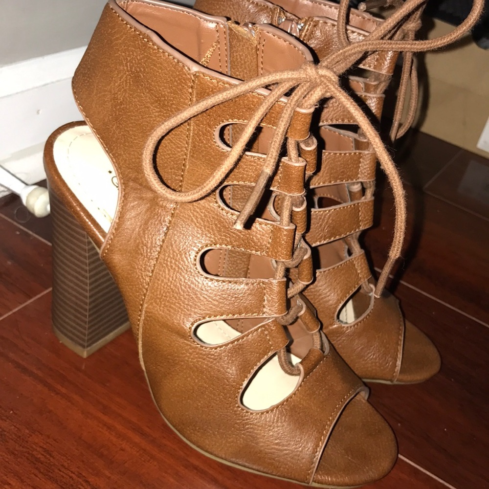 I am selling a pair of lace high heels.